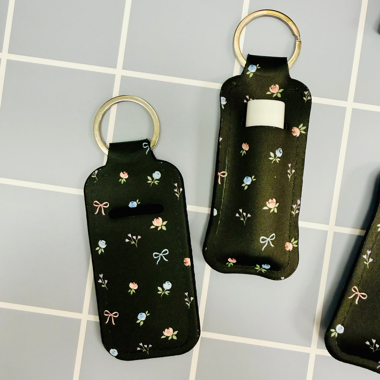 Chapstick Holder Keychain, Black Ditsy Floral and Bows Pattern