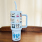 40oz Tumbler with Lid and Straw, TS 1989 Polaroids on Blue